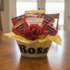 Boss Gift Basket on a wooden indoor dining table